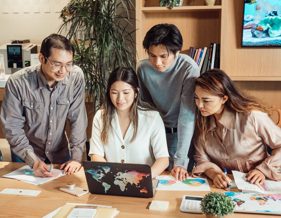 Shaoxing Fabrics team reviewing fabric orders